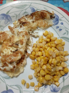 A picture of Fried Eggs with Sardine and a dash of sweet corn.
