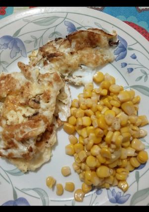 A picture of Fried Eggs with Sardine and a dash of sweet corn.