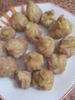 Una foto de Saquitos de Gyozas de pollo y langostinos