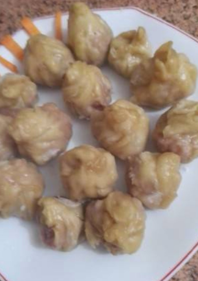 Una foto de Saquitos de Gyozas de pollo y langostinos