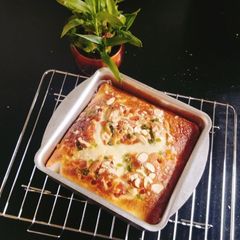 A picture of Fluffy Spongy Cake /Eggless spongy Nuts cake in (OTG).