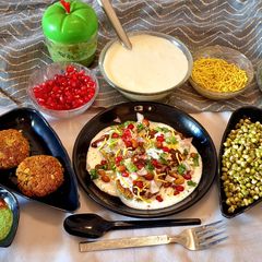 A picture of High protein Paneer Sprouts tikki and Dahi tikki Chaat (healthy starter or snack).