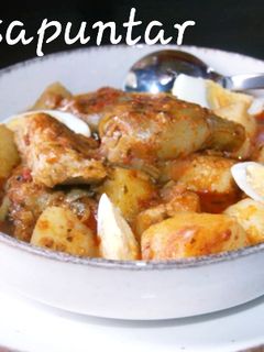 Una foto de Bacalao con patatas y alcachofas 🐟