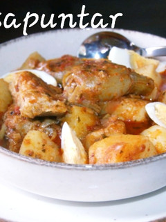 Una foto de Bacalao con patatas y alcachofas 🐟