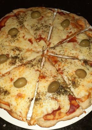 Una foto de Pizza muzzarella