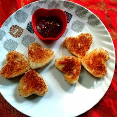 A picture of Chesse potato heart sandwich.