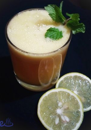 A picture of Mosambi/sweet lime juice.