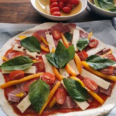 A picture of Cheese and cheery Pizza.