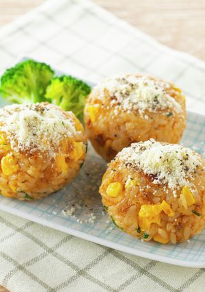A picture of Carbonara Rice Balls with Chicken Soboro.
