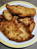 Filetes de pechuga de pollo a las finas hierbas empanados