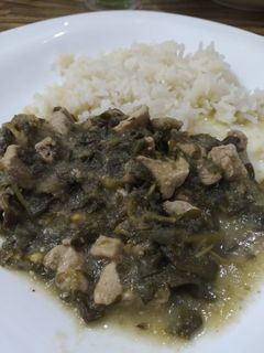 Una foto de Verdolaga con cerdo en salsa verde