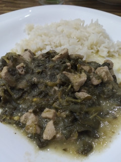 Una foto de Verdolaga con cerdo en salsa verde
