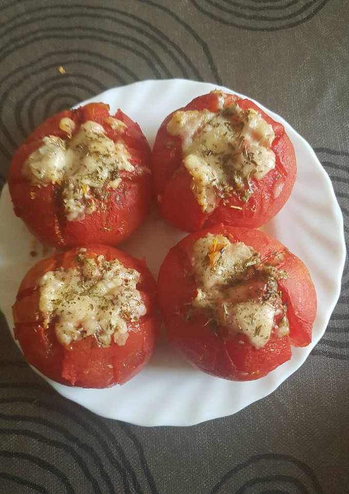 Una foto de Tomates con parmesano