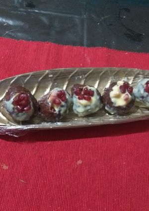 A picture of Chocolate golgappas with fruits.