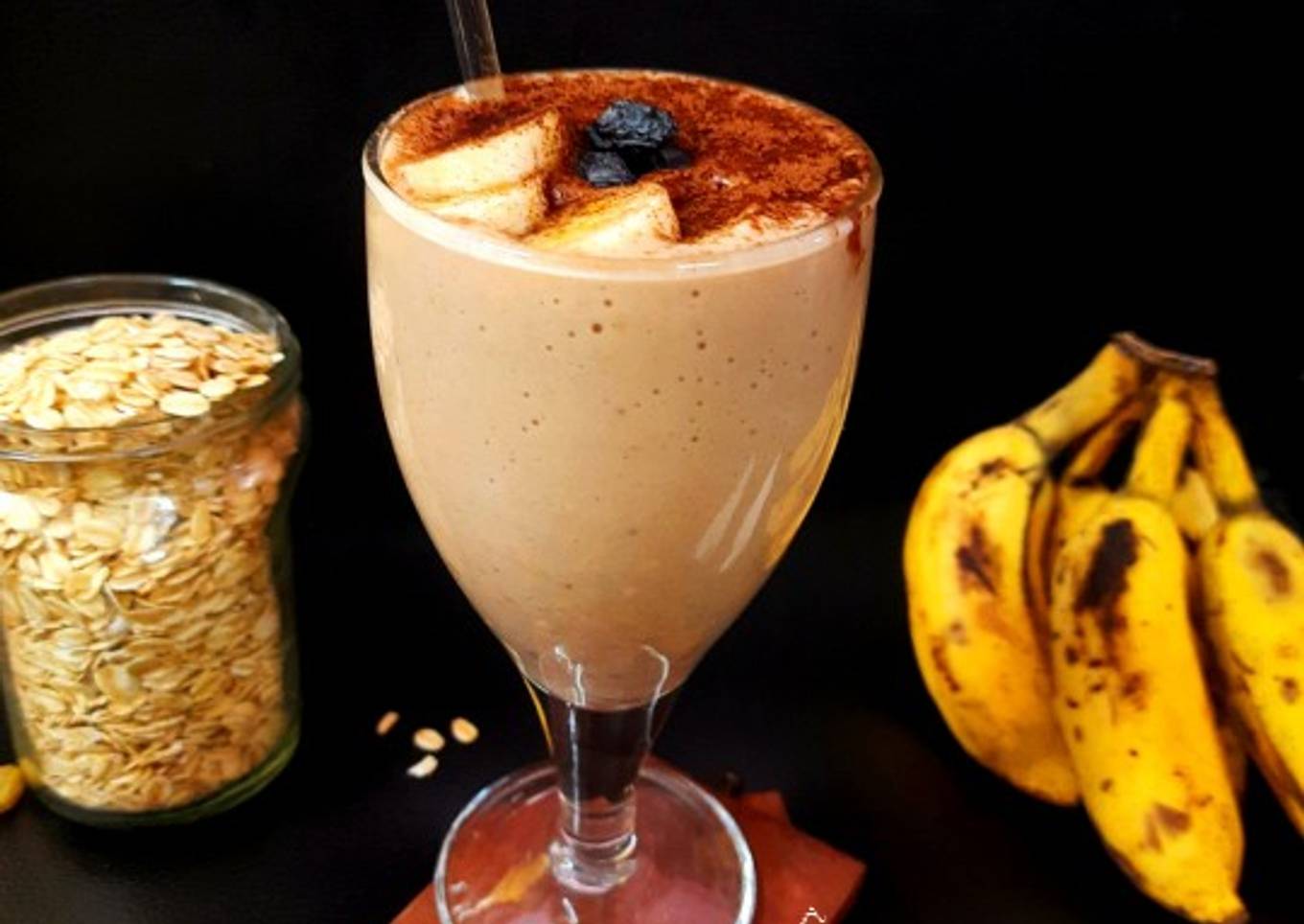 Vegan smoothie with oats, banana and coconut