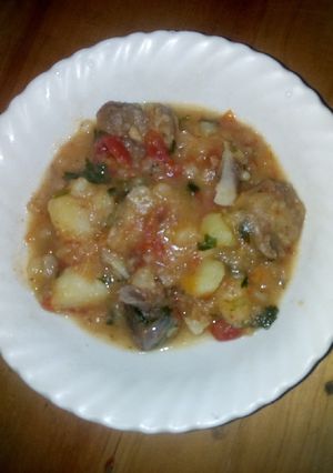 A picture of Goat meat with potatoes#4weekschallenge.