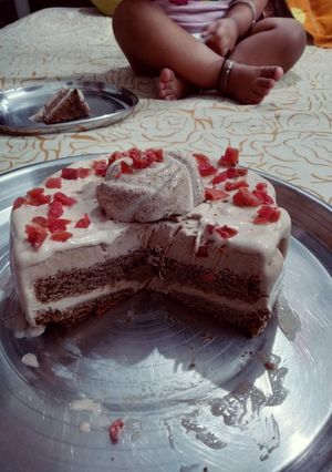 A picture of Chocolate ice cream cake with tutti frutti.