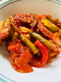 A picture of Bacon with Tortellini and Asparagus.