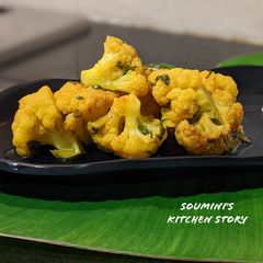 A picture of Fulkopir Bati Chorchochori (Cauliflower Florets with coriander).