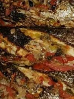 صورة لوصفة سمك بوري في صنية