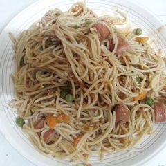 A picture of Spaghetti skewered sausages.