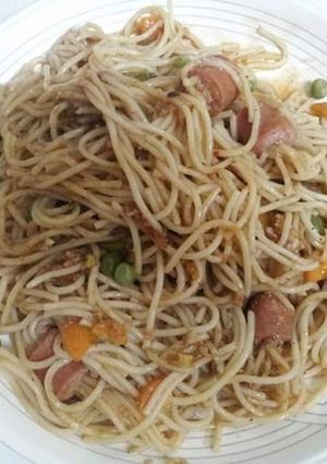 A picture of Spaghetti skewered sausages.
