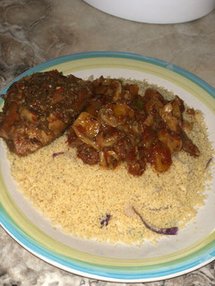 A picture of Steamed couscous with stew.