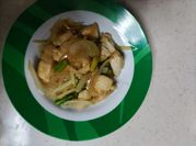 A picture of chicken breast with asparagus