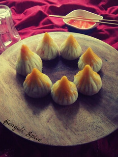 A picture of Stuffed Paneer and Coconut Modak.