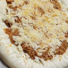 A picture of Tandoori cheesy weezy pizzaaa(broadway style).