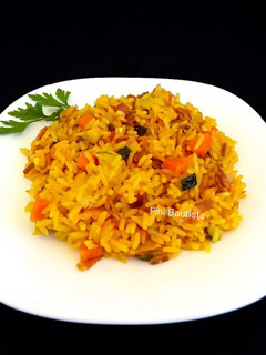 Una foto de Arroz con calabacín, zanahoria y panceta fina
