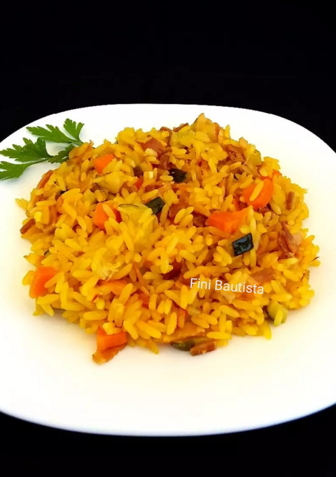 Una foto de Arroz con calabacín, zanahoria y panceta fina