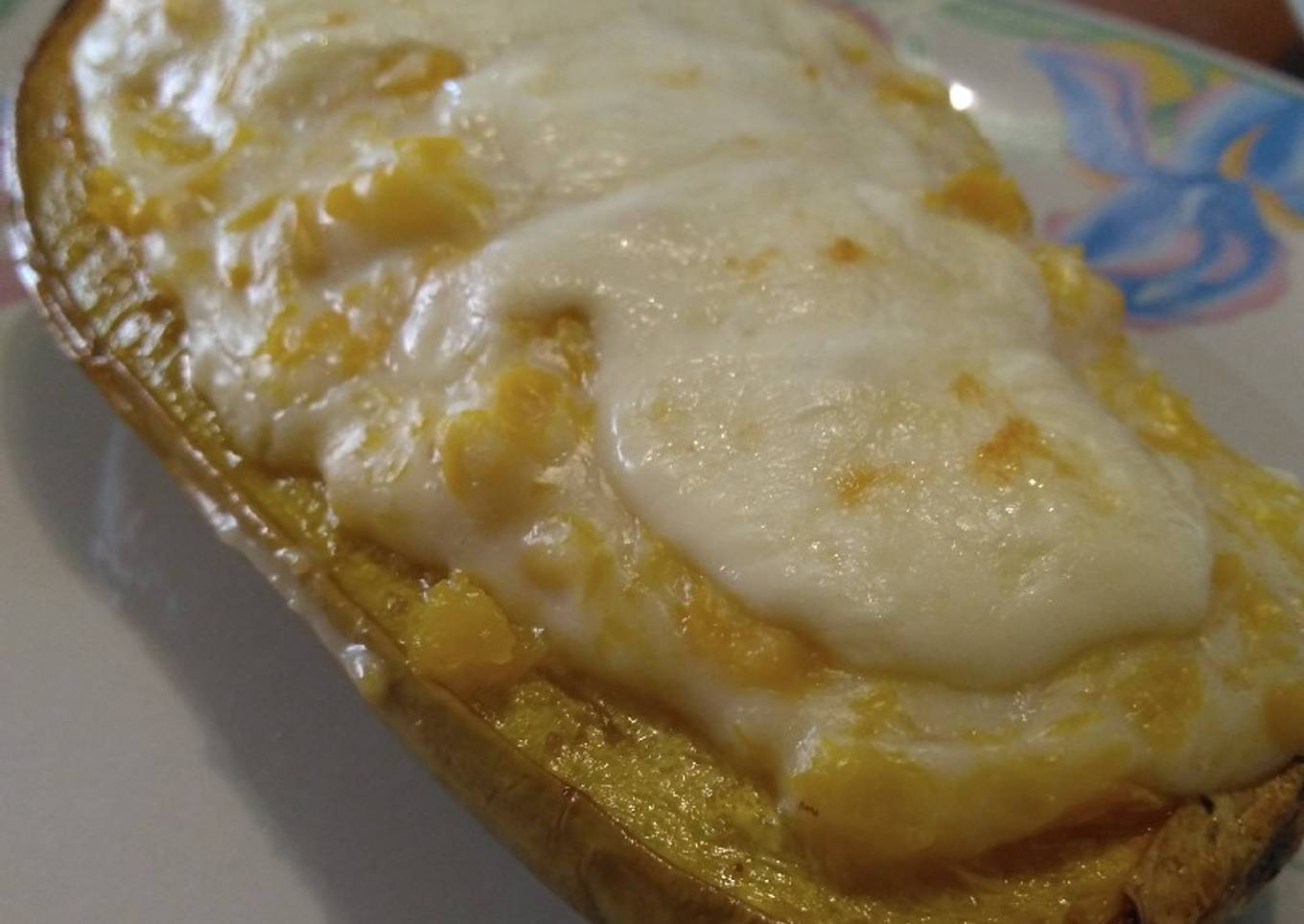 Calabaza rellena con choclo y salsa blanca