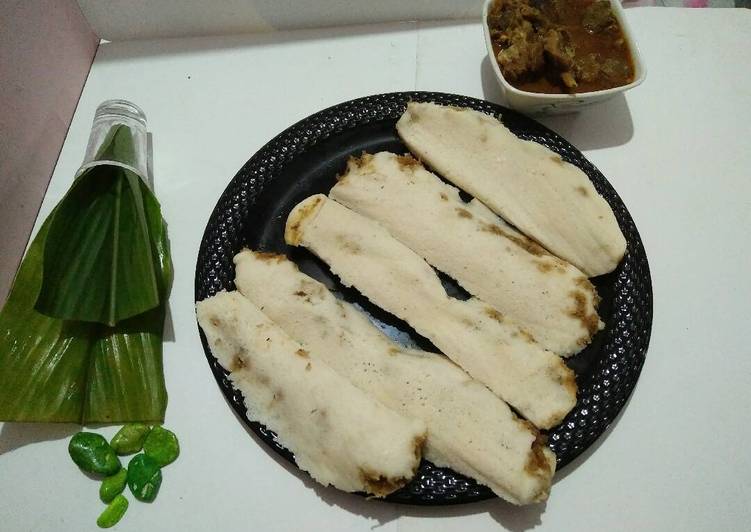 Recipe of Homemade Coconut stuffed haldi patra(turmeric leaves) pitha