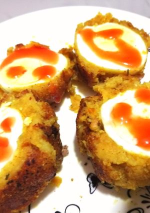 A picture of Potato scotched eggs.
