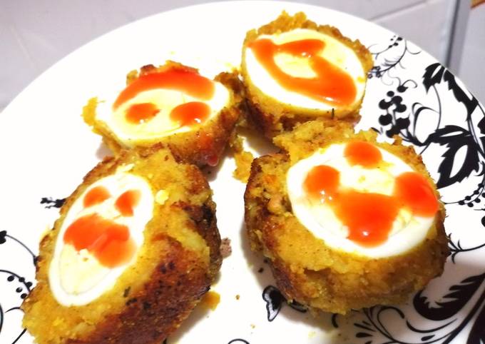 Potato scotched eggs