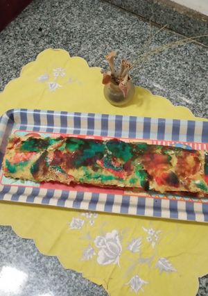 Una foto de Pionono de queso azul y morrón