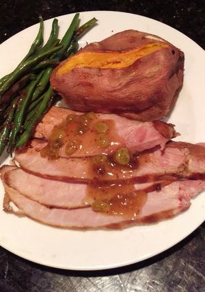 A picture of Glazed Baked Ham w/ Rum-Raisin Sauce.