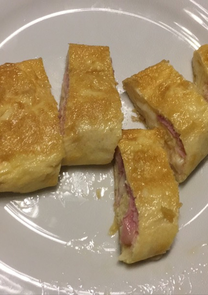 Una foto de Kebap de tortilla con bacon y queso