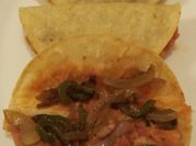 Una foto de taco de papa y chorizo