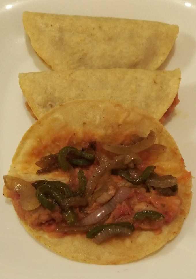Una foto de Tacos envenenados con su salsa