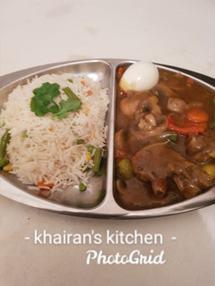 A picture of Rice and vegetables curry soup.