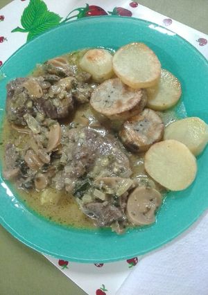 Una foto de Lomo al champiñón