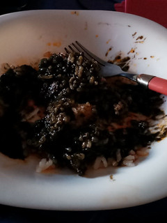 Una foto de Arroz blanco con calamares en su tinta