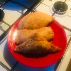 A picture of Homemade chicken samosa.