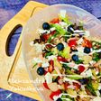Salad with smoked salmon and canned pear