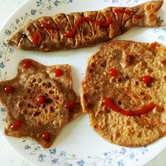A picture of Fish,star and round shaped ragi flour stuffed Paratha.