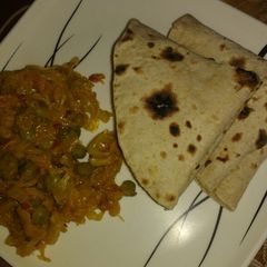 Cabbage peas with chapati A picture of Cabbage peas with chapati.