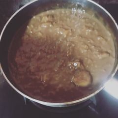 A picture of Nutella Champorado w Bananas or Nutella Chocolate Rice Porridge w Bananas.