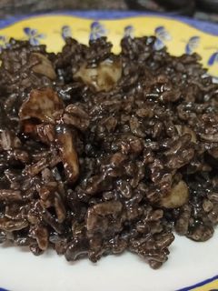 Una foto de Arroz negro con sepia
